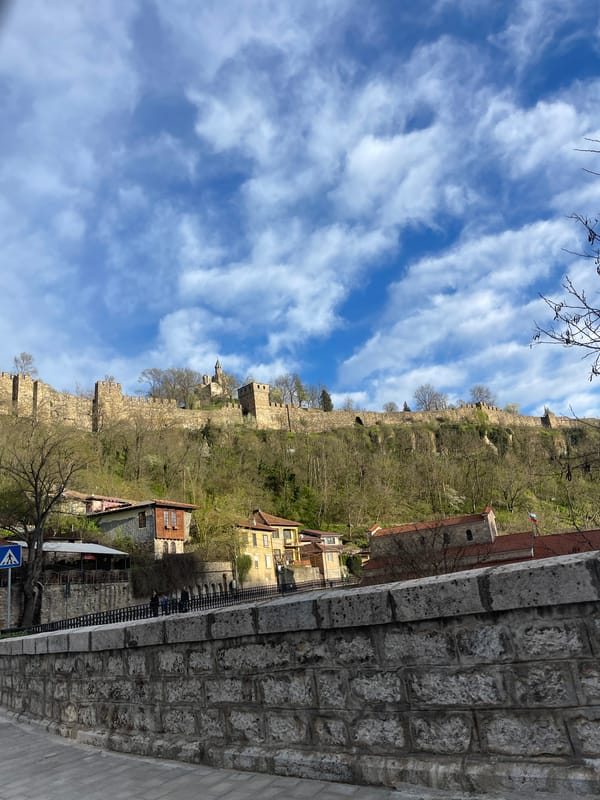 Tourist documents historic sites during drive through Veliko Tarnovo