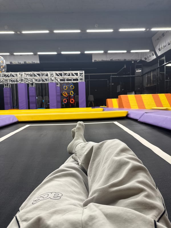 Person sits on trampoline in Shumen, Bulgaria