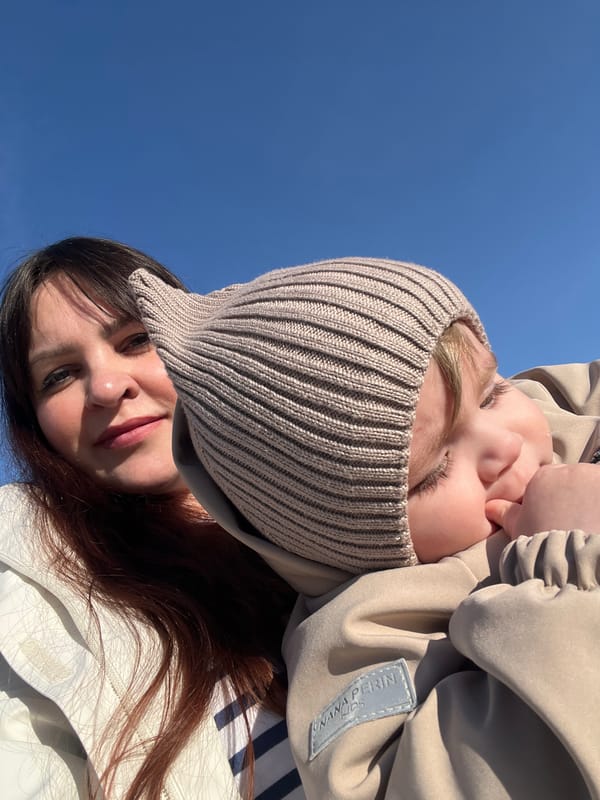 Family outing documented in Russian residential neighborhood during spring