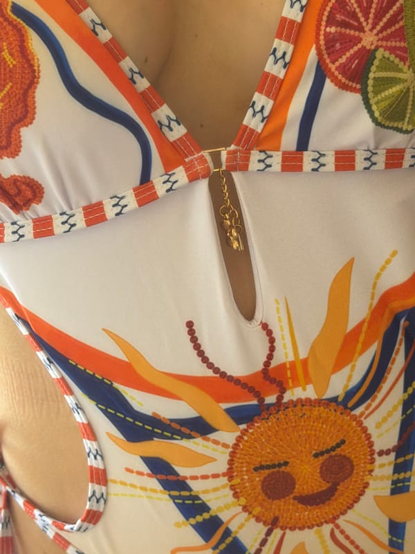 Beach-ready outfit check in a Cyprus bathroom, swimsuit edition