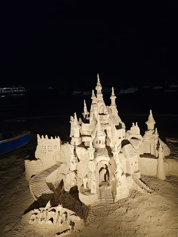 Night scenes in Armação Dos Búzios feature sandcastle, music performance