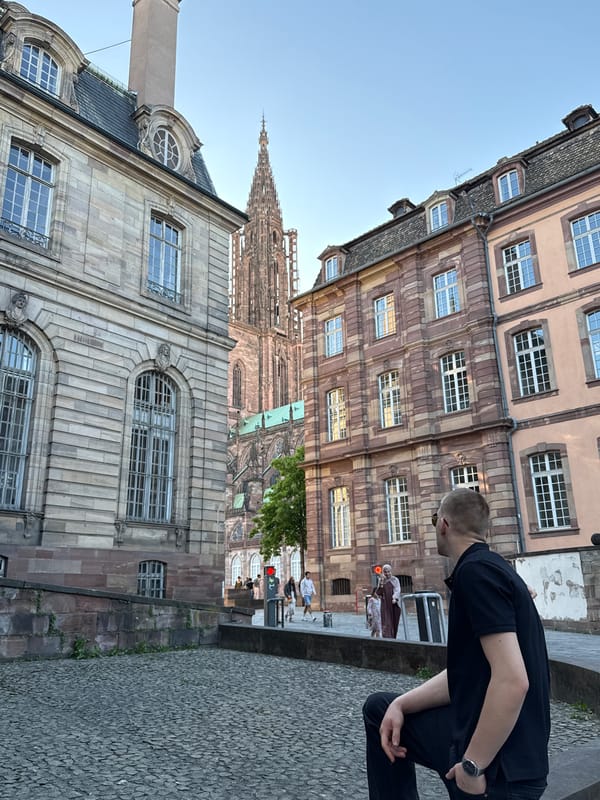 Tourist captures casual street scenes during Strasbourg walking tour