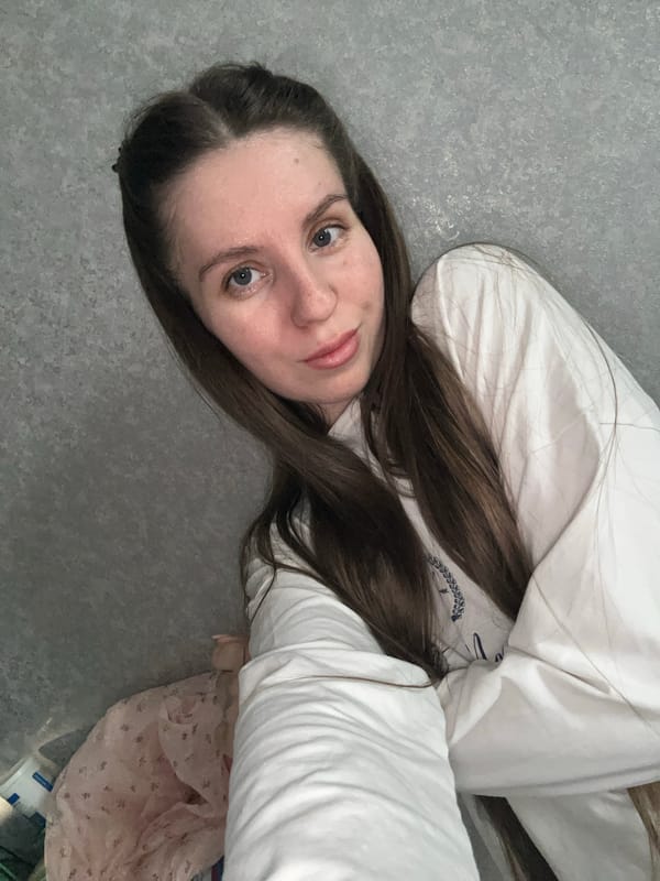 Woman photographed resting indoors in Klin, Russia