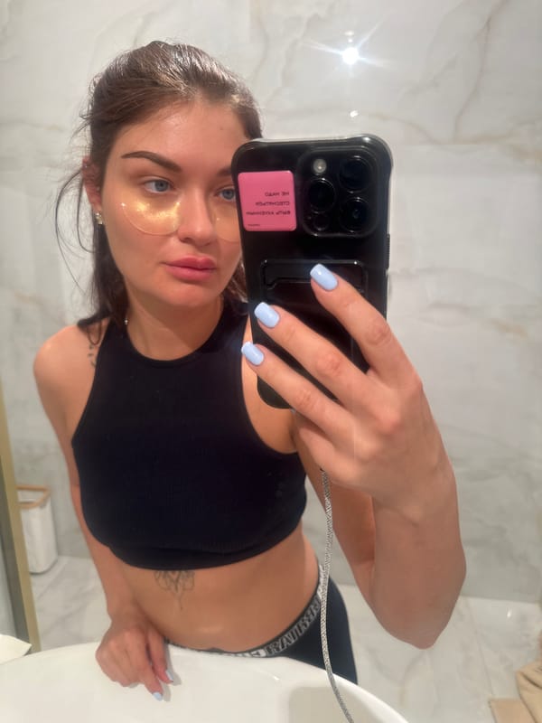 Woman Takes Selfie in Moscow Bathroom While Wearing Beauty Patches