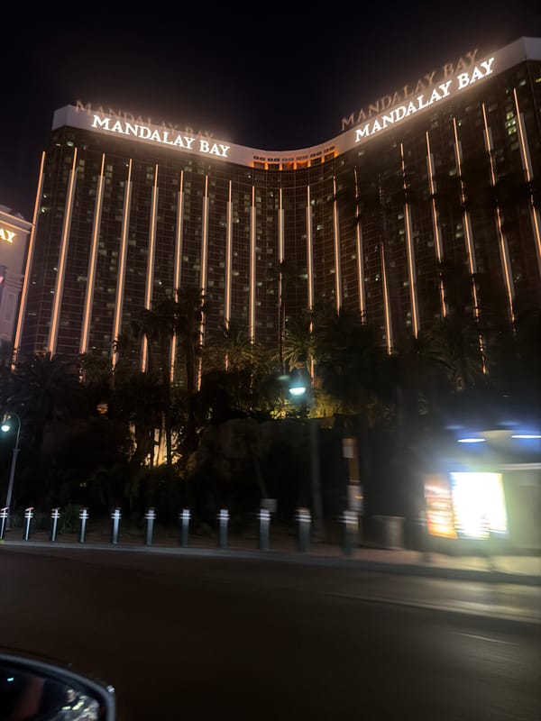 Mandalay Bay Resort illuminated during late night hours in Vegas