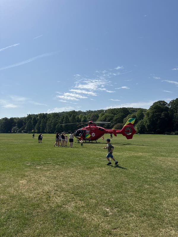 Air ambulance helicopter lands in High Wycombe field