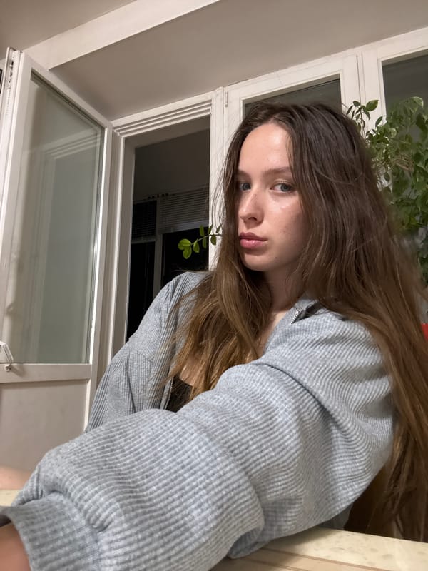 Woman photographed in multiple poses near window in Chaikovsky