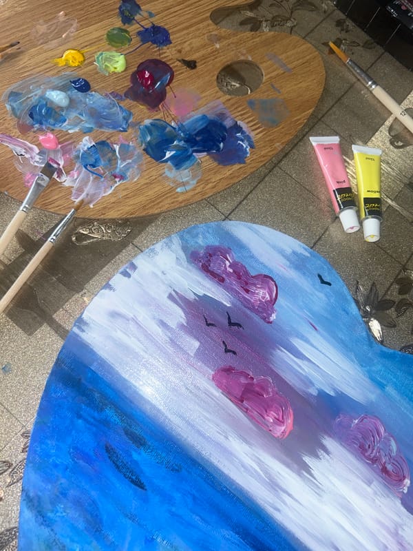 Artist's workspace with palette and unfinished painting documented Bulgaria
