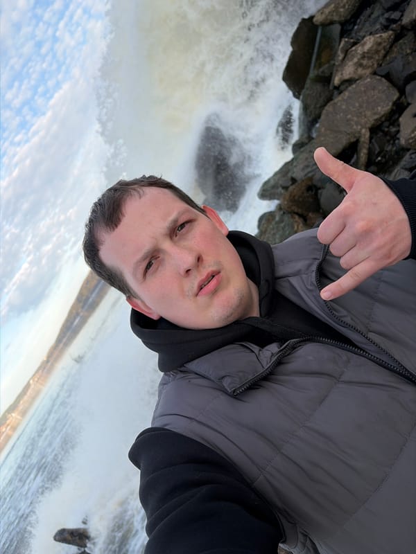 Visitors document waterfall dam site in Chernushka, Russia