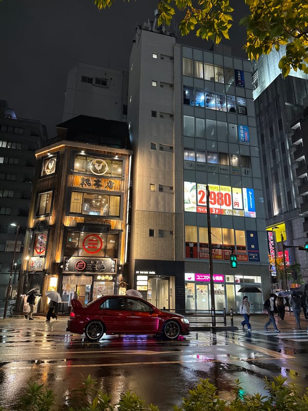Wet street scene captured in Chiyoda following rainfall