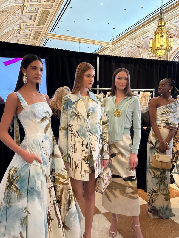Fashion show with models in formal gowns held in Palm Beach