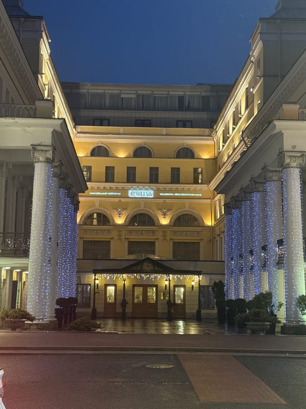 Evening street scene captured at Grand Hotel Europe, Saint Petersburg