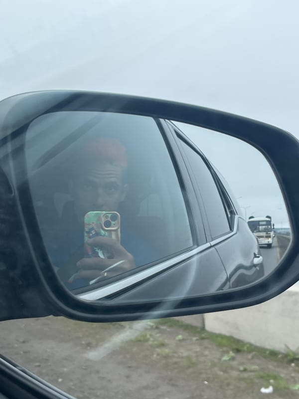 Mirror selfies captured in vehicle, indoors in Chaikovsky, Russia