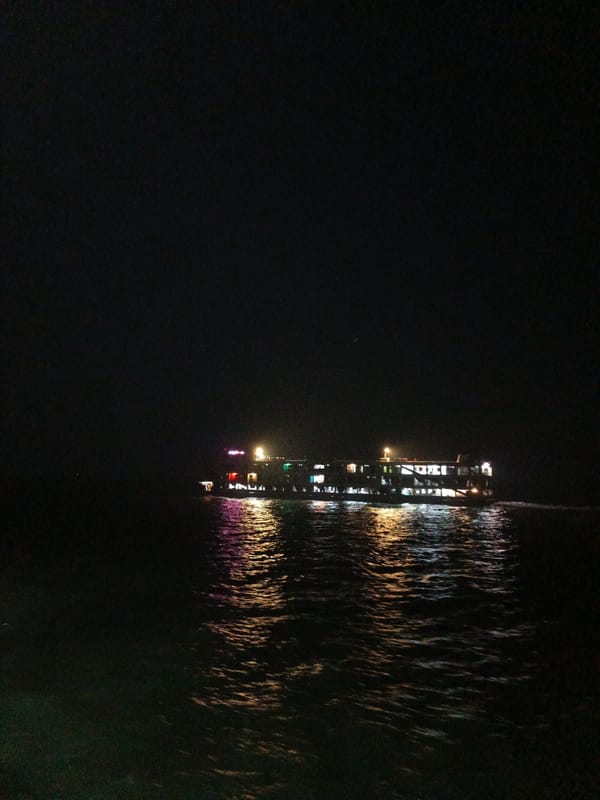 Illuminated boat spotted on river in Chandpur at night