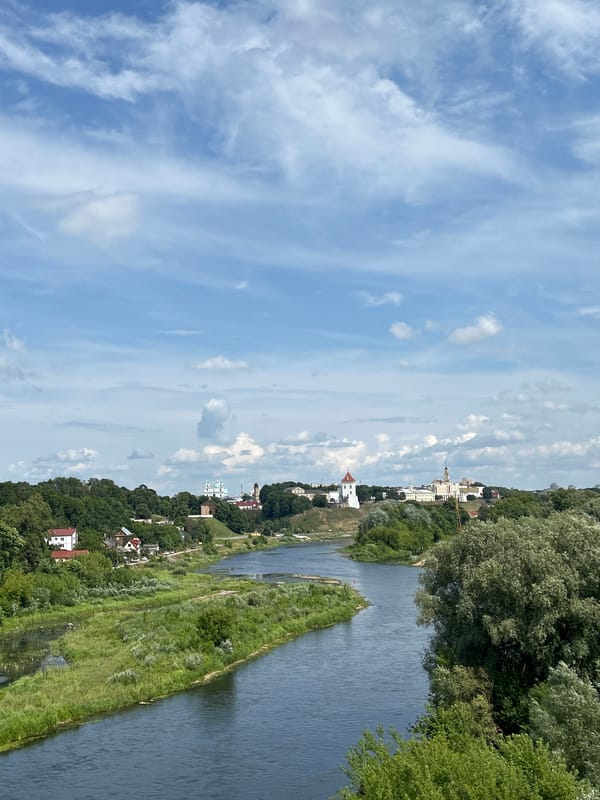 Hrodna's riverside castle district on a summer afternoon