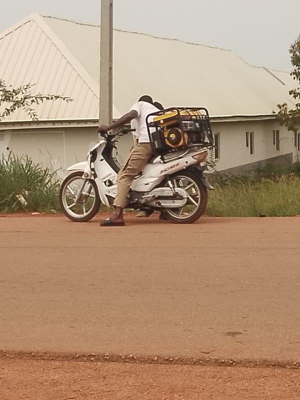 Everyday street life along the roads of Agwala, Nigeria