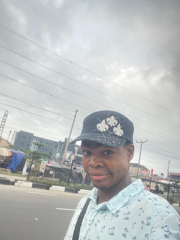 Selfie moment on a Lagos street, cloudy morning
