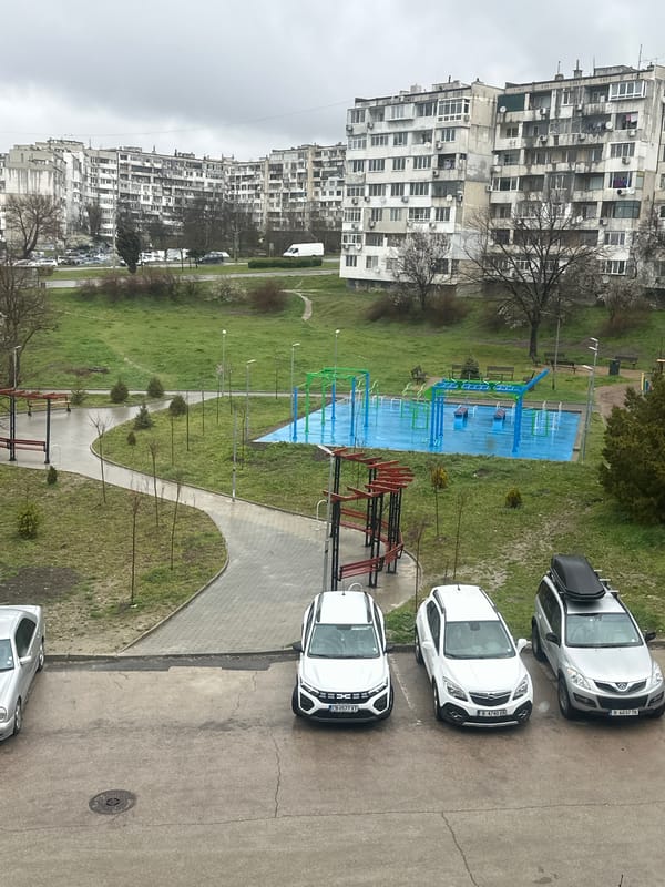 Aerial view shows Soviet-era apartments and playground in Varna