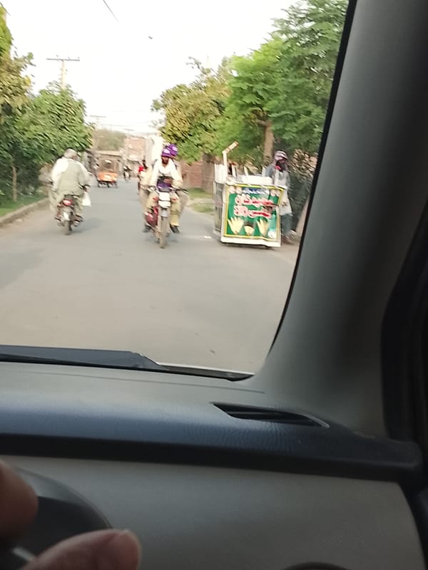 Routine street activity documented in Pakistani residential colonies