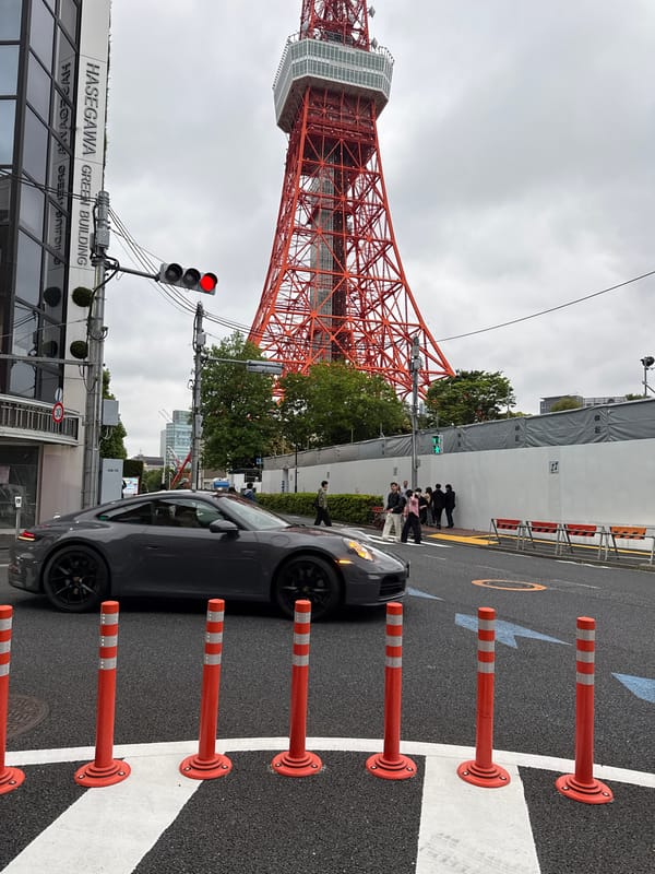 Tokyo Tower photographed under overcast skies in Minato