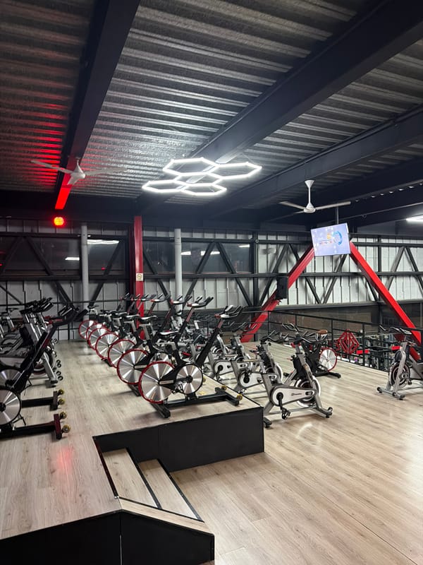 Indoor fitness and retail spaces documented in Cholula