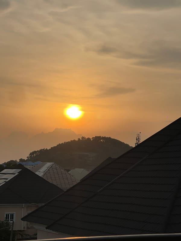 Abuja sunset from multiple angles, rooftops and open sky