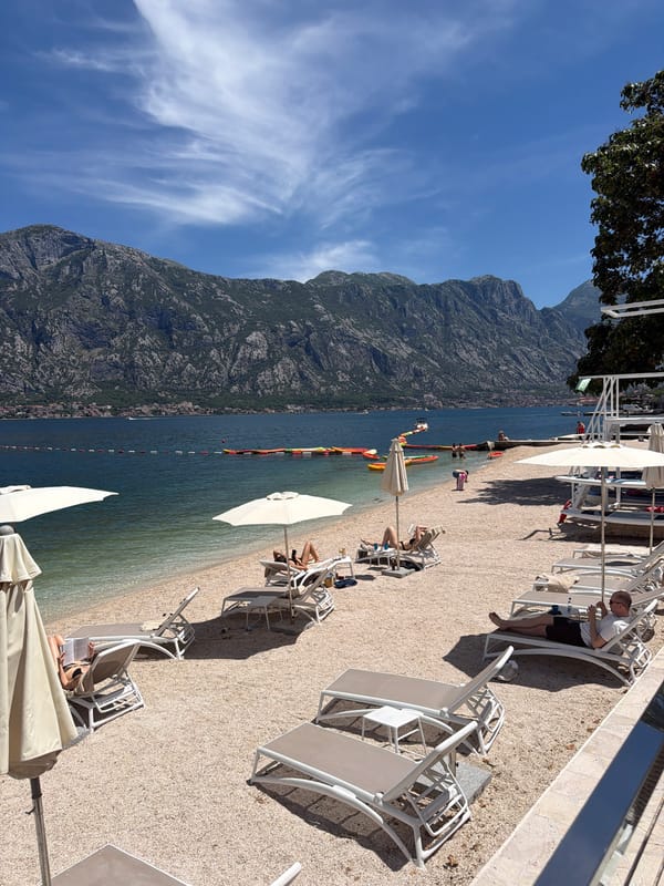 Beach activity documented at Prčanj, Montenegro coastal resort