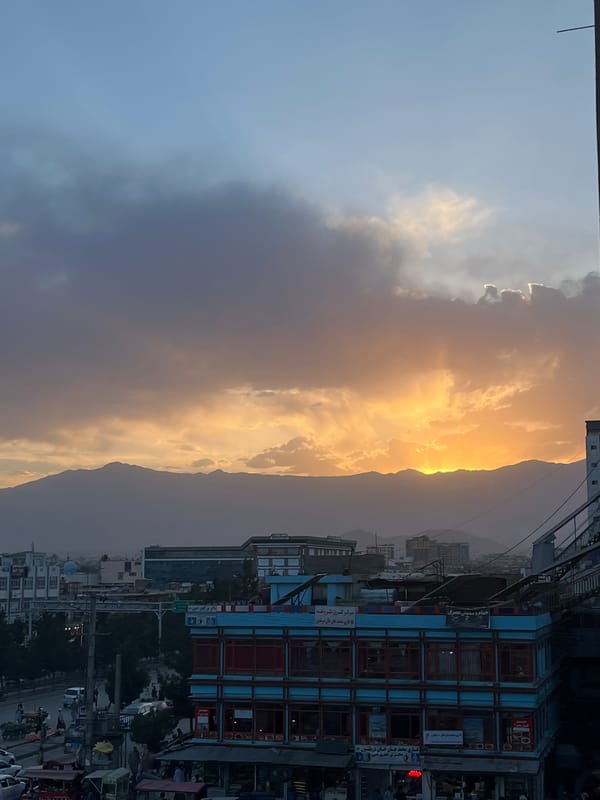 Kabul streets and skyline from afternoon into nightfall