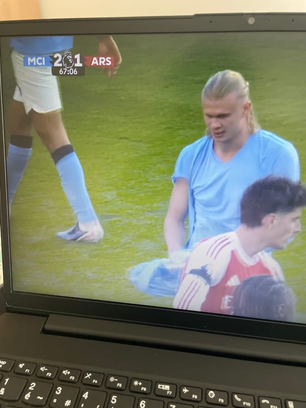 Football match viewed on laptop in Parthenay shows City beating Arsenal