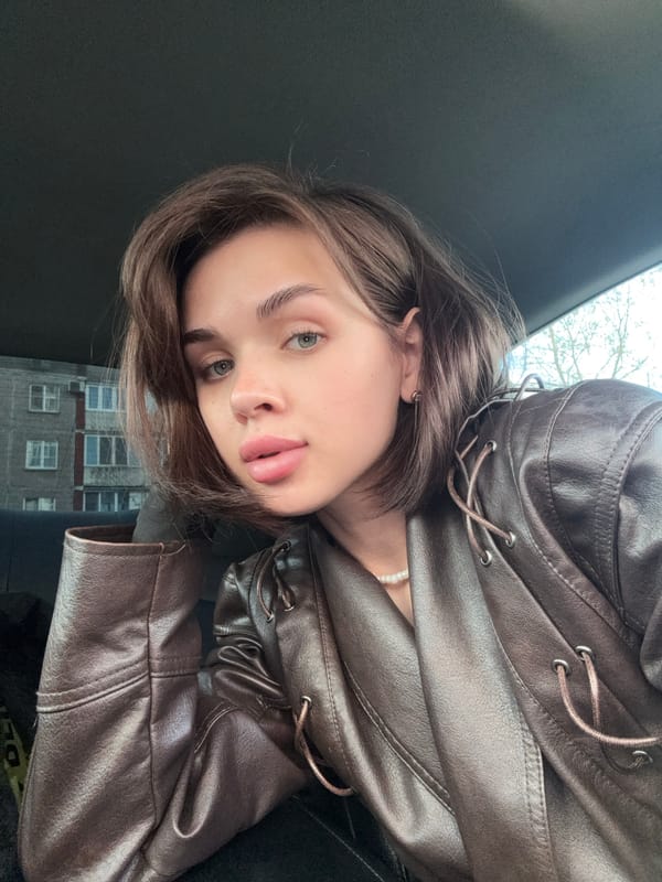 Woman photographed at multiple locations in Perm during afternoon