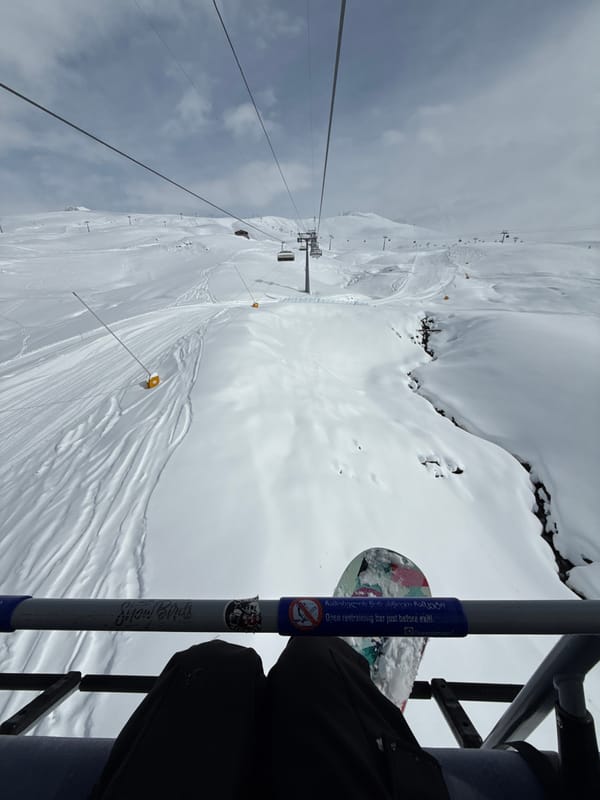 Ski lift passenger captures mountain view in Gudauri