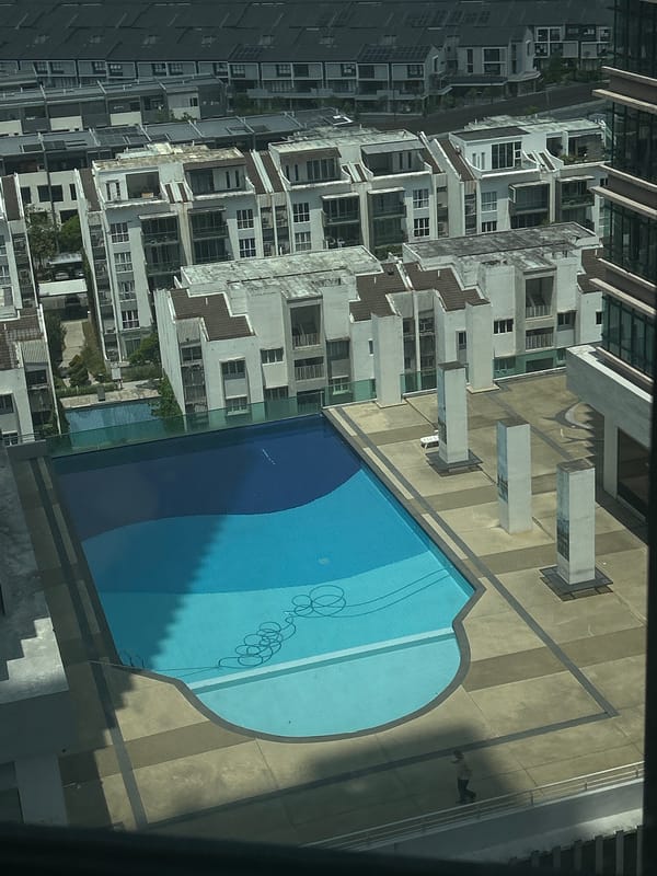 Aerial view captures residential pool complex in Kuala Lumpur