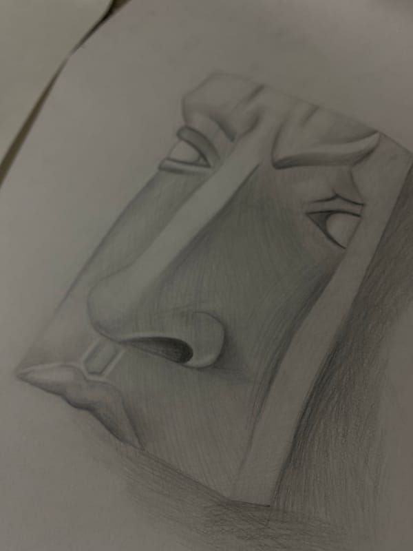 Artist sketches face sculpture and fruit drawings in Yerevan