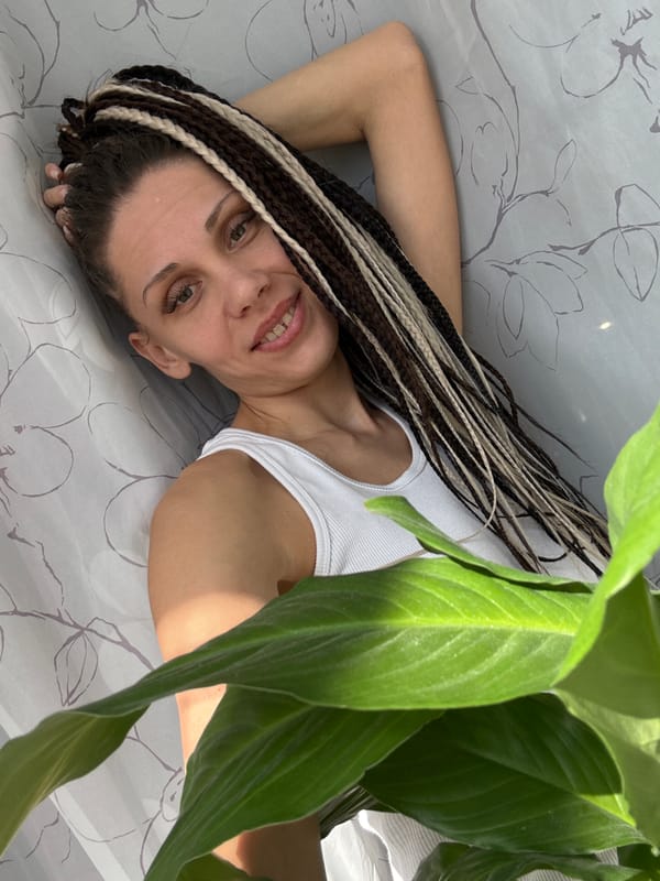Woman conducts indoor photo session in Rusanovo, Russia