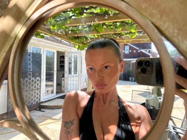 Woman takes morning selfies on Tunbridge Wells patio