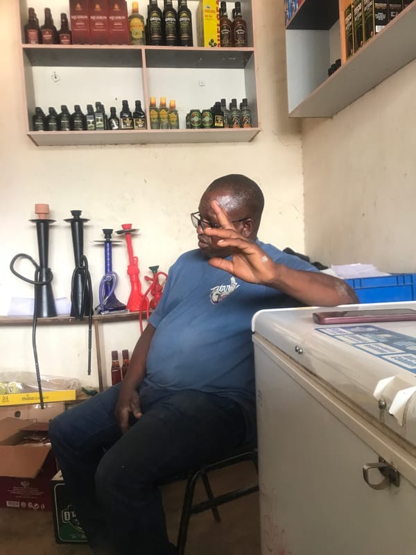 Man spotted shopping in retail store in Kabong, Nigeria
