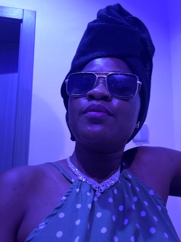 Selfie session in a blue-lit Ajara venue, consistent look throughout.