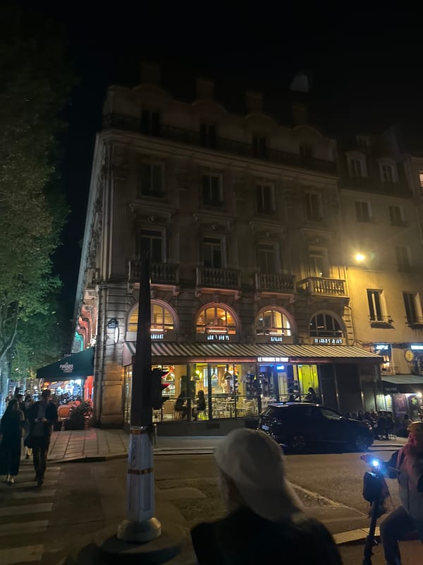 Evening street life continues in central Paris