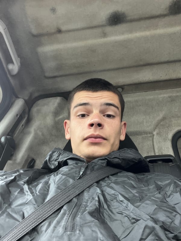 Young man photographed in neutral portrait in Karlovo, Bulgaria