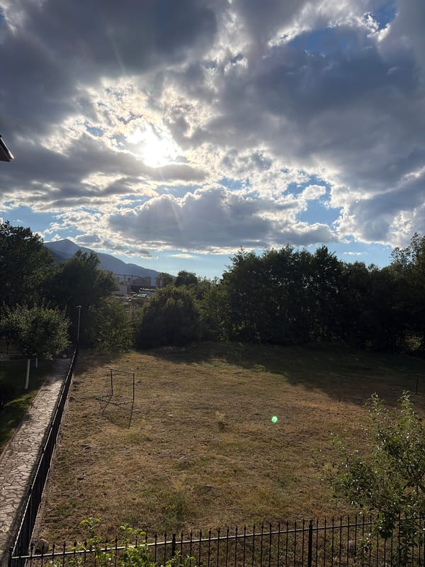 Dramatic summer skies over a Bansko balcony, July afternoon