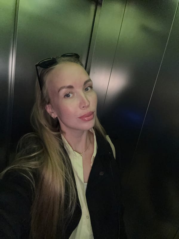 Woman takes elevator selfies in Sirius, Russia