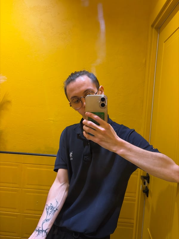 Selfie session and fish painting, yellow wall setting