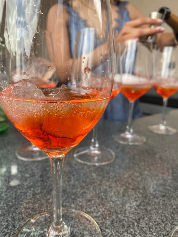 Orange cocktails served in wine glasses in Mexico