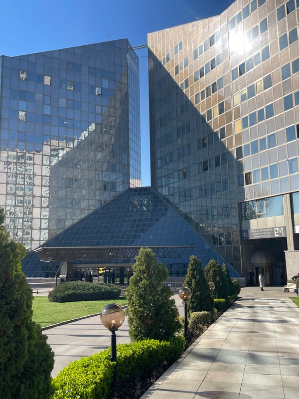 Modern glass buildings and pedestrian areas documented in Sofia