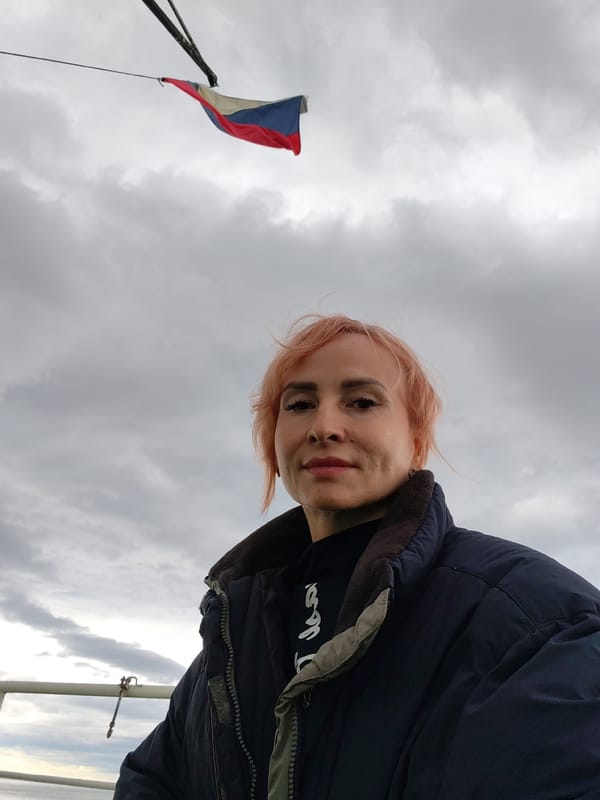 Aboard a ship off the Russian coast, flag flying