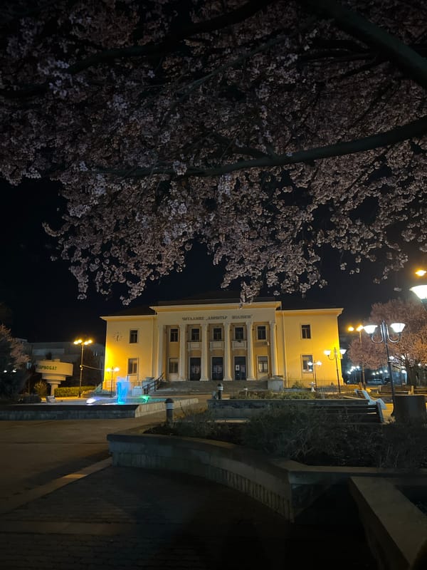 Cultural center illuminated at night in Karnobat, Bulgaria
