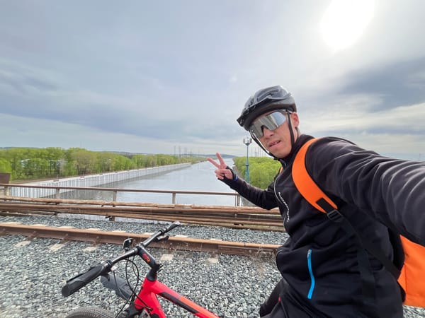 Cyclist takes selfie on railroad tracks in Chaikovsky, Russia