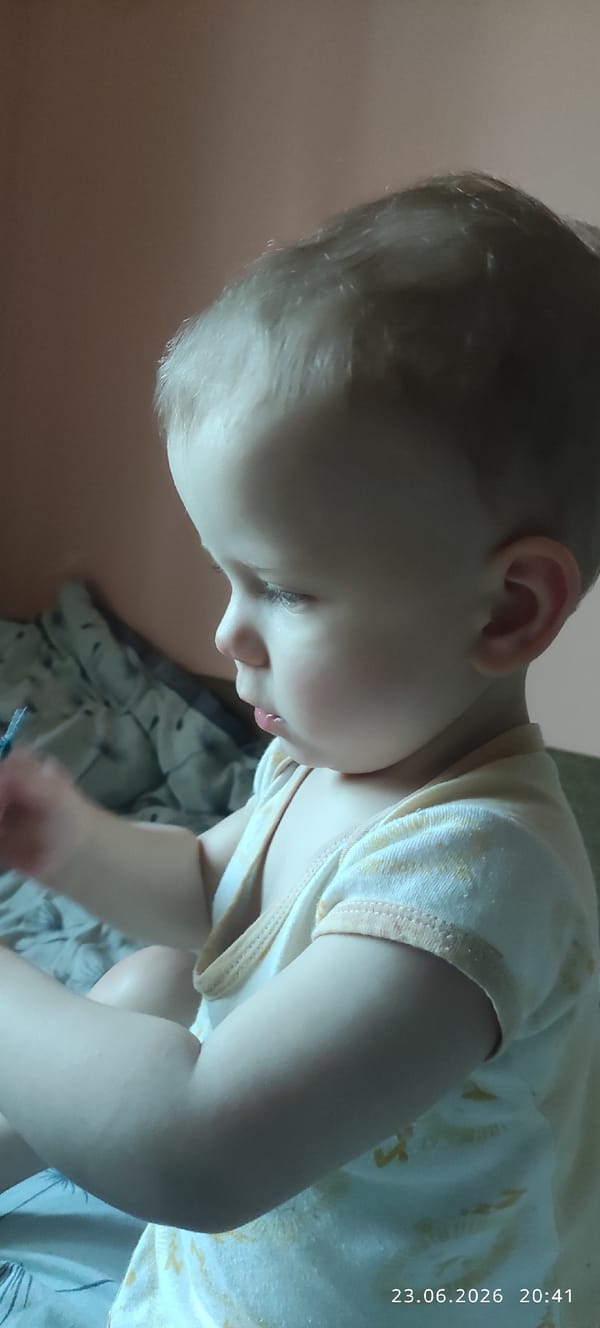 Baby resting at home, two angles.