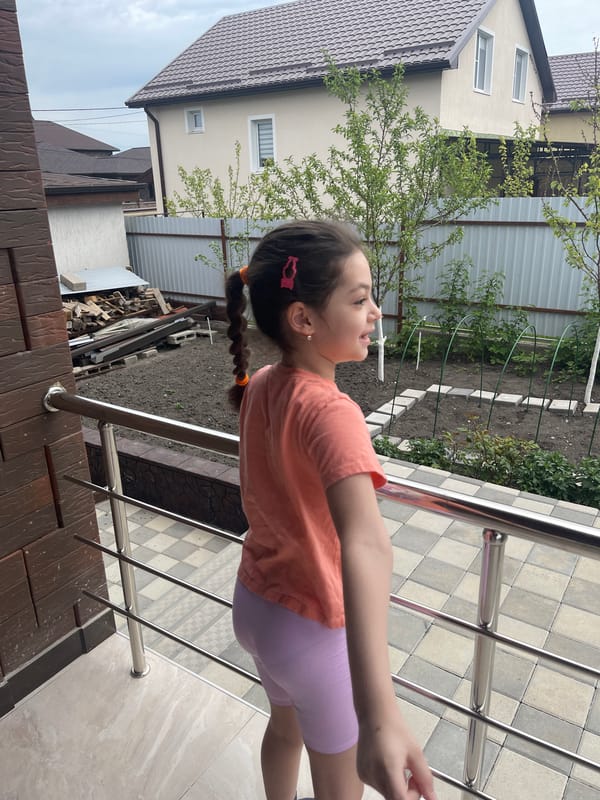 Child's morning routine captured in Yessentukskaya garden home