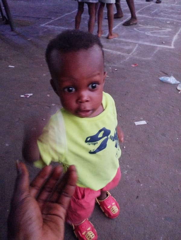 Street life captured in Nigerian neighborhoods during afternoon hours